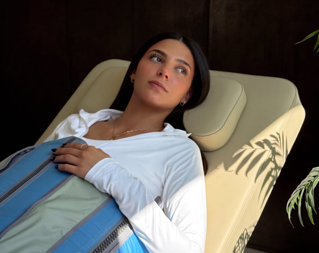 A client resting during a compression therapy session